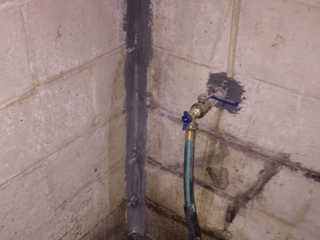 Fuller Center sealed basement leak